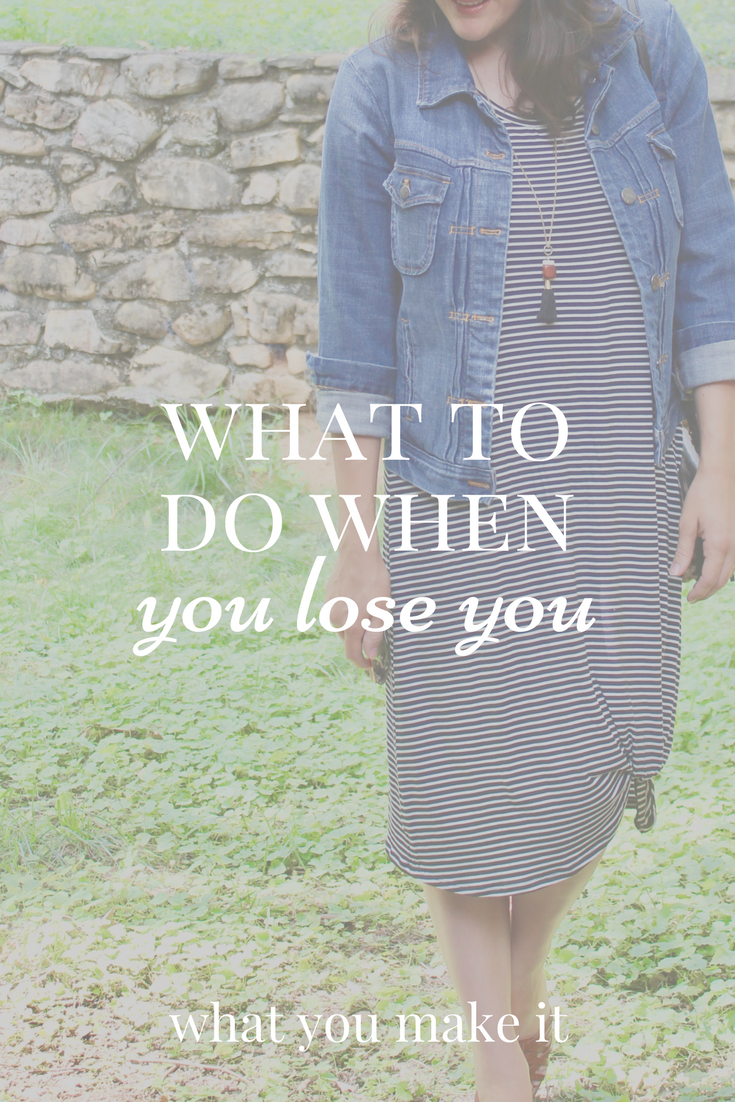 Woman in striped dress and denim jacket.